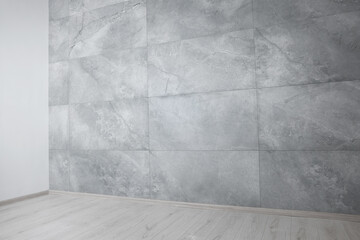 Empty renovated room with clean light walls