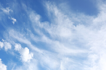 Picturesque blue sky with white clouds on sunny day