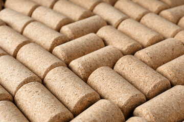 Many corks of wine bottles as background, closeup