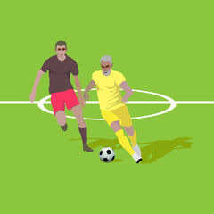 father and son playing football