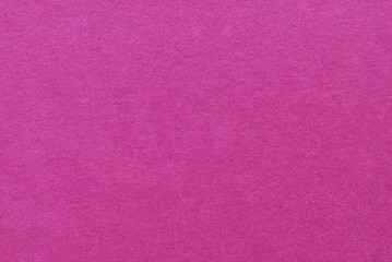 Purple colored craft paper texture as background