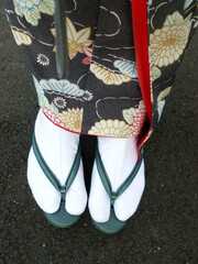 Geta  are traditional Japanese footwear, kind of sandals, resembling flip-flops. Women outfit for...