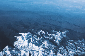 Ice-covered mountain peaks. View from above © dizfoto1973