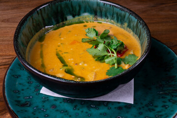 Pumpkin and carrot soup with cream