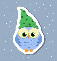 Vector baby owl wears green hat with stars sticker