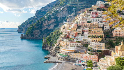 The pearl vertical city of the Amalfi Coast: Positano, the large beach, the church and the two...