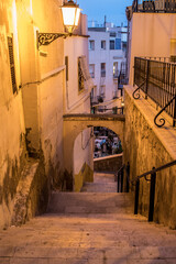 narrow street in the old town of Alicante, Spain