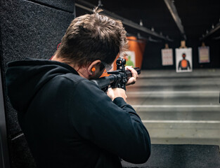 man with a gun in a Shooting range