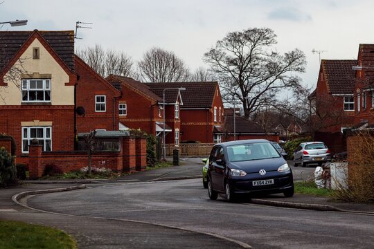 Neighborhood In Newark On Trent  UK With Houses And Cars On A Cloudy Day