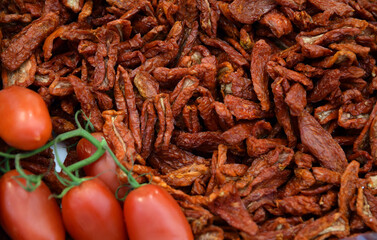 pile of sun-dried tomatoes at the market