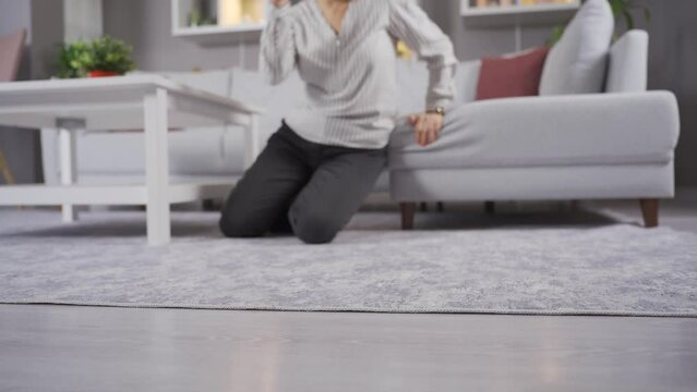 Senile. Mature old woman faints.
The woman sitting on the sofa at home becomes ill and faints. 
