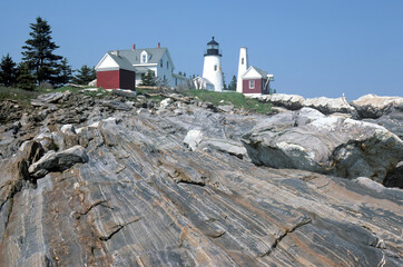 Scenic and historic Pemaquid Point Light and Lighthouse in coastal Maine. This section of rocky...