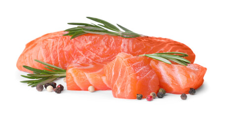 Pieces of fresh raw salmon and spices on white background