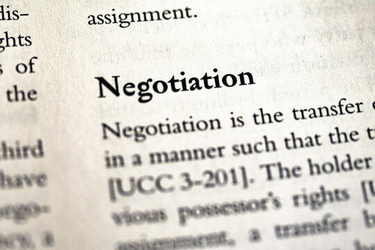 dictionary definition of the Negotiation written in business law and ethics book