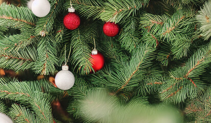 Fototapeta na wymiar Cozy christmas tree with red balls