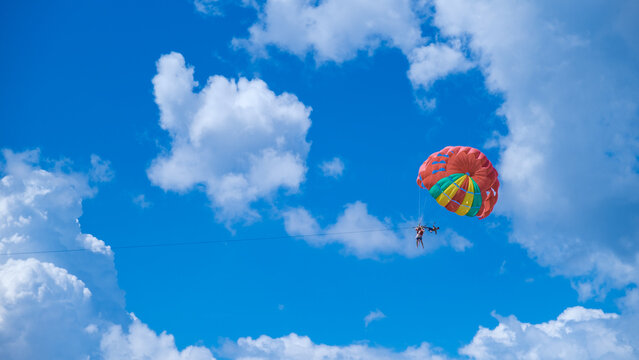 Parachute in the sky at the beach of Kata Phuket Thailand