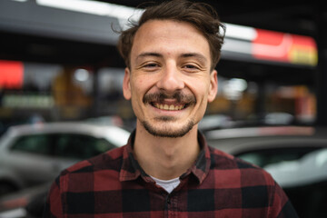 portrait of one adult caucasian man modern male with mustaches