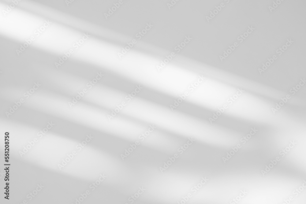 Poster gray shadow and light blur abstract background on white wall from window. dark grey shadows indoor i