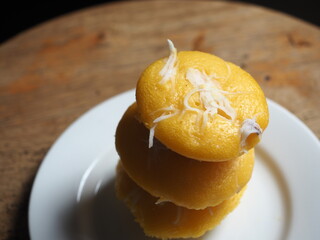 Thai toddy palm cake with shredded young coconut topping