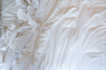 white blanket on bed, textured of fabric