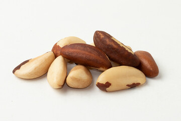 Brazilian nut known as castanha do Pará isolated on white background.