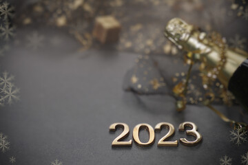 Happy New Year. Symbol from number 2023 on stone background