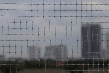 Plastic bird net install at the balcony. Prevention pigeon bird concept.