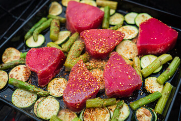 tuna and vegetables on grill