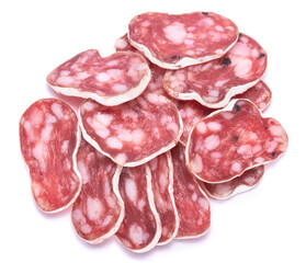 slices of Spanish Fuet thin dried salami sausage isolated on a white background
