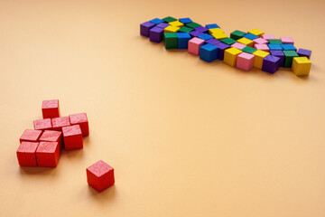 Affinity bias concept. Red cubes lie separately from other colors. - obrazy, fototapety, plakaty