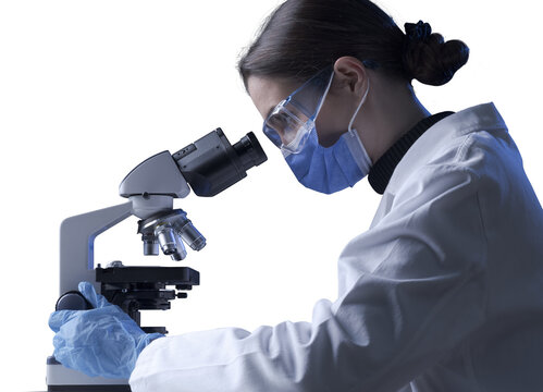 Researcher using a professional microscope