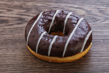 Glazed sweet tasty chocolate donut