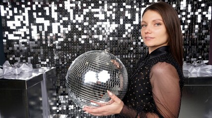 woman with disco ball