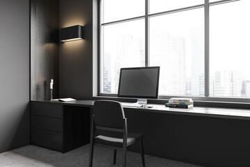 Fototapeta premium Grey business interior with workplace and pc computer, panoramic window