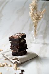 Close-up of homemade chocolate brownies on cutting board