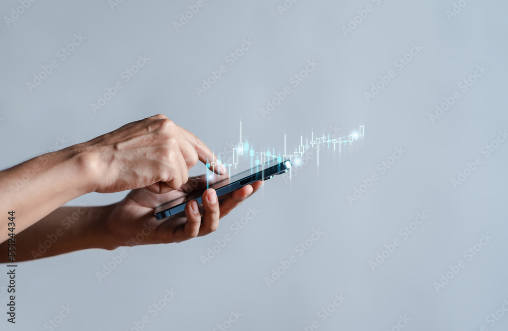 Poster Hand of Businessman or trader is showing a growing virtual hologram stock on smartphone, planning and strategy, Stock market, Business growth, progress or success concept. invest in trading