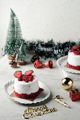 strawberry cheese cake decorated with fresh fruits on table with christmas decoration. Delicious and sweet pink strawberry cake for Valentines or birthday party,christmas.Homemade bakery concept