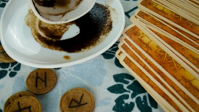 Fortune telling different coffee, tarot and runes. Selective focus.