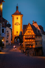 Rothenburg ob der Tauber, picturesque medieval city in Germany, famous UNESCO world culture heritage site, popular travel destination in beautiful light.