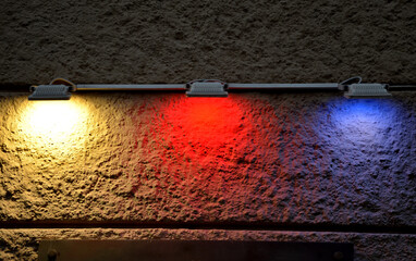 low angle illumination of the facade of a historic building. LED light halogen color combination with the possibility of changing the color scene.