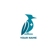 Logo for medicine with woodpecker.