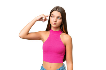 Teenager caucasian girl over isolated background making the gesture of madness putting finger on...