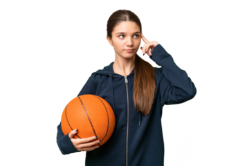 Teenager caucasian girl playing basketball over isolated background having doubts and thinking
