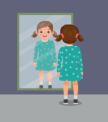 happy little girl standing in front of mirror looking her reflection with new dress
