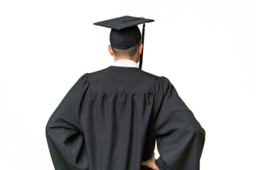 Young university graduate man over isolated background in back position