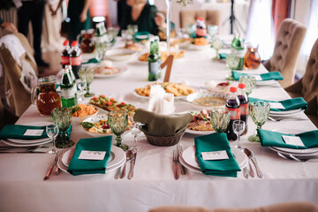 Served table in beautiful wooden restaurant. Wedding concept