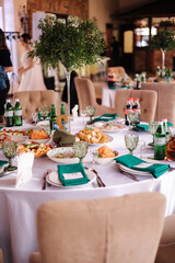 Served table in beautiful wooden restaurant. Wedding concept