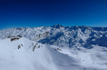 Fototapeta na wymiar Mountain range in ski resort Trois Vallees, France