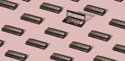 Fashionable isometric pattern with a palette of eye shadow on a pastel nude background - obrazy, fototapety, plakaty