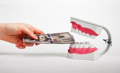 Money for teeth health, tooth healthcare, dental treatment, dentistry service